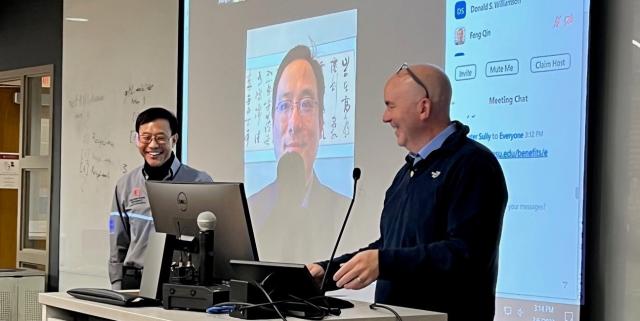 Dr. Mohler presenting award to Dr. Zhang