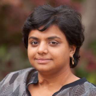 woman with short black hair outside