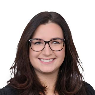 woman with glasses and black top