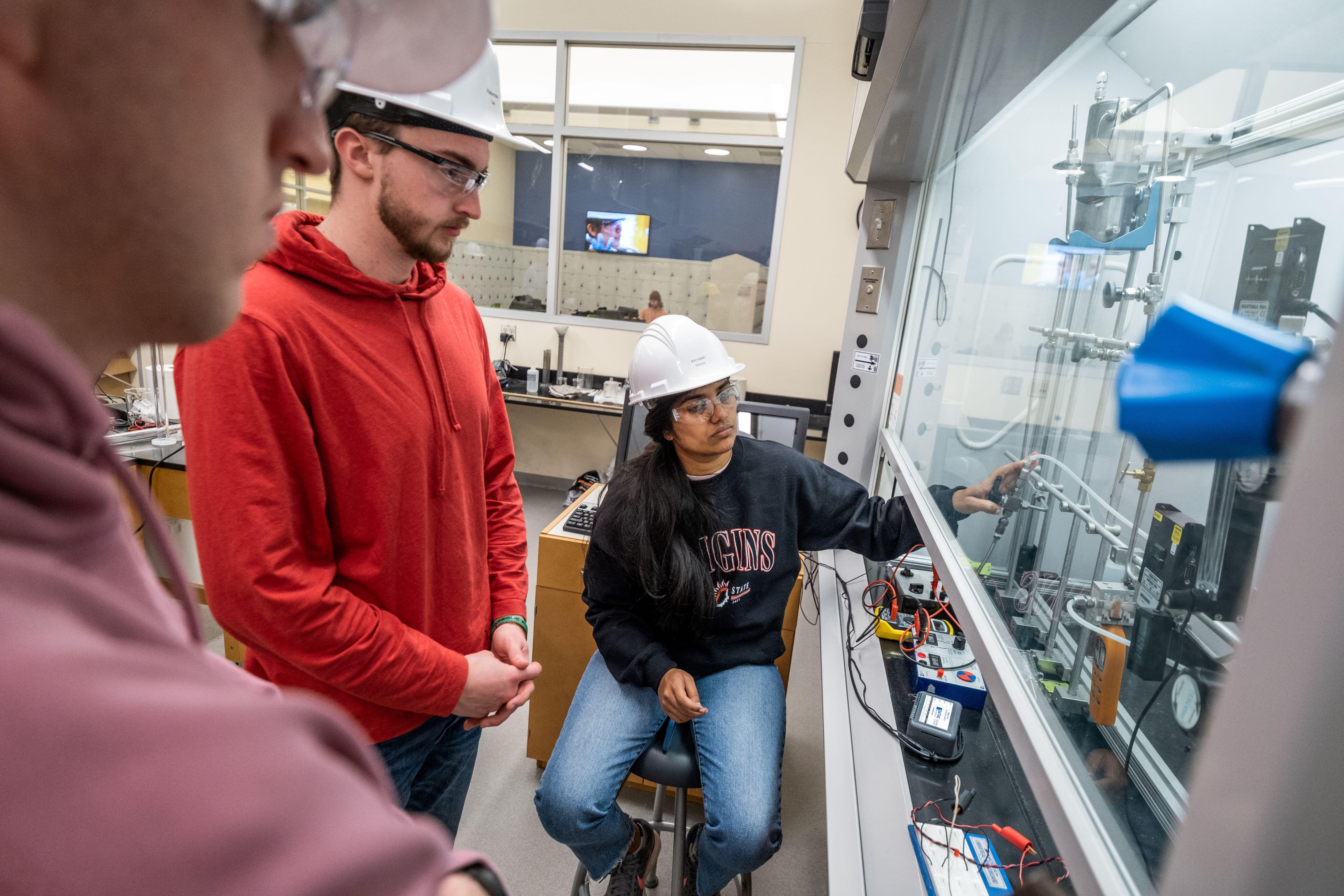 students working in a battery lab