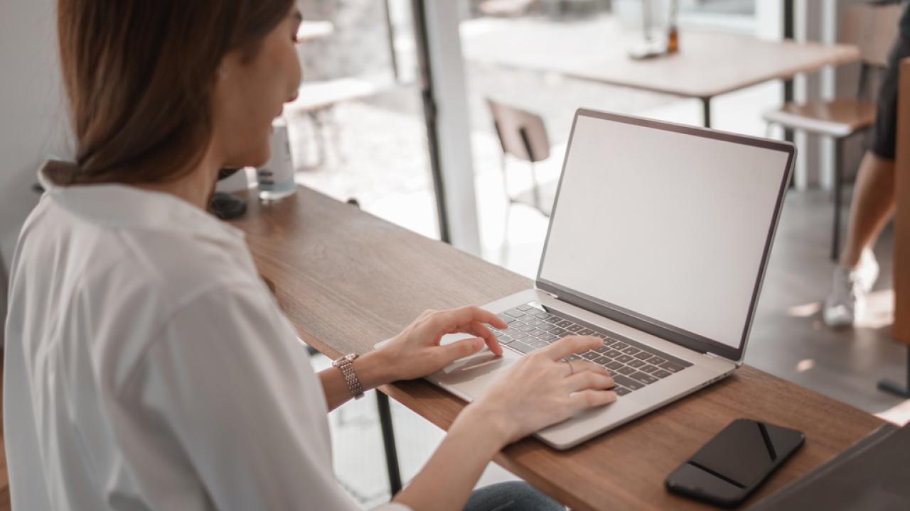 woman sitting at computer