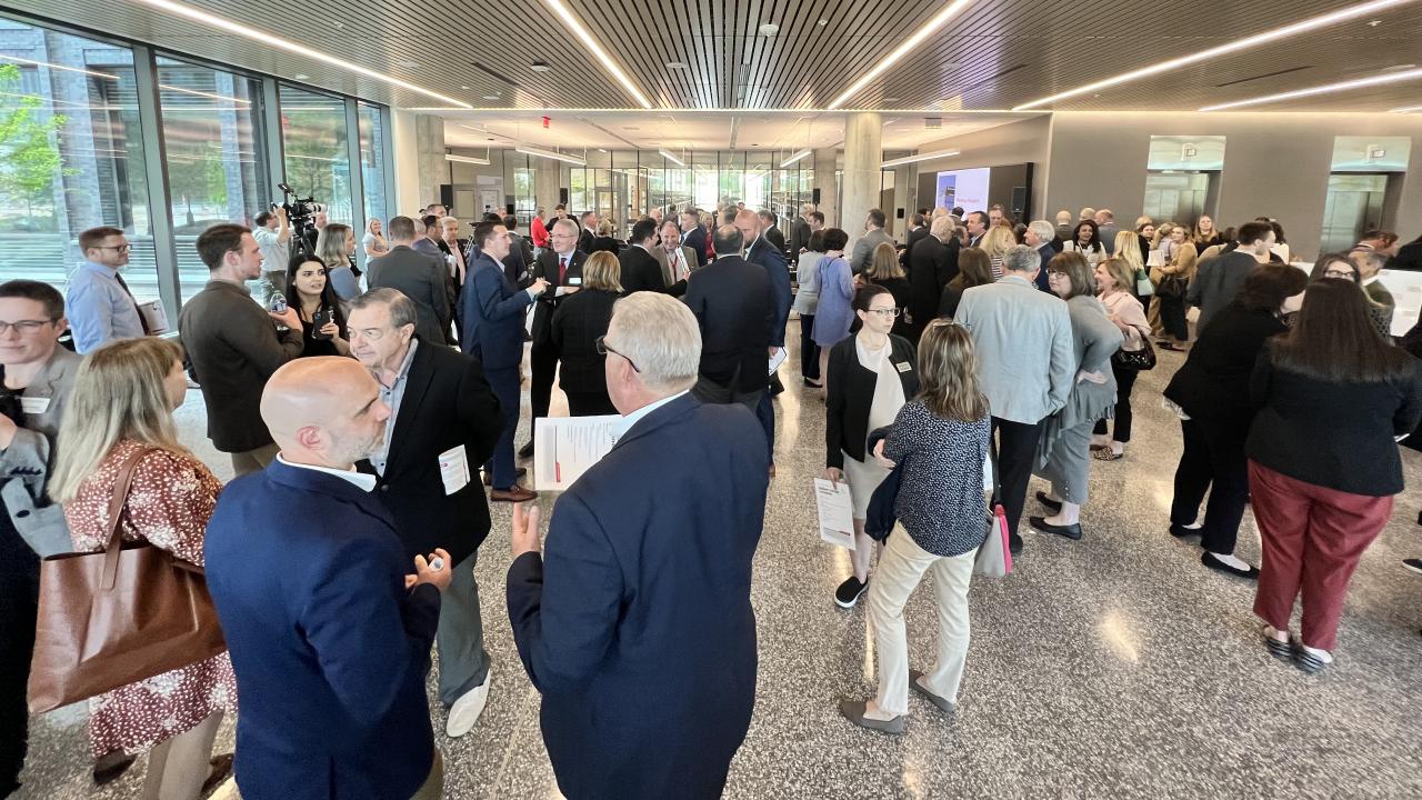 a room full of people standing