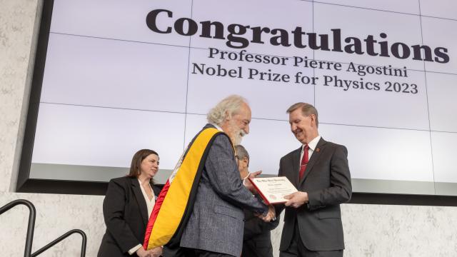 agostini receives award from president Carter
